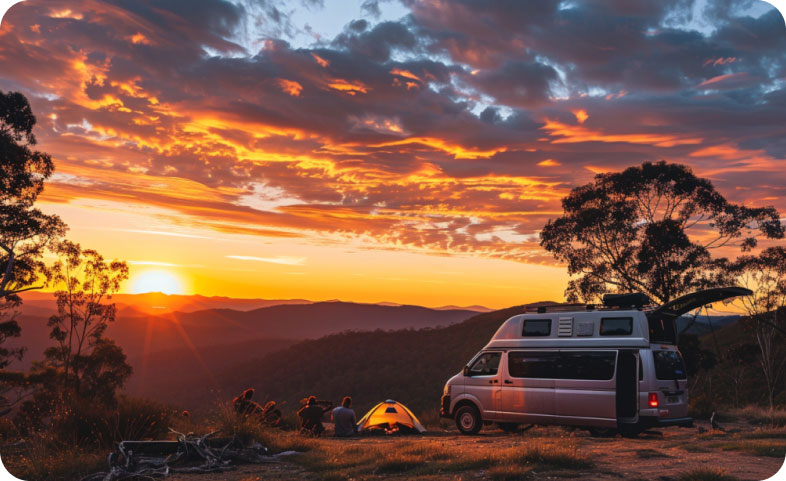 A parked mini bus at sunset, ready for the next day's Australian road trip adventure.